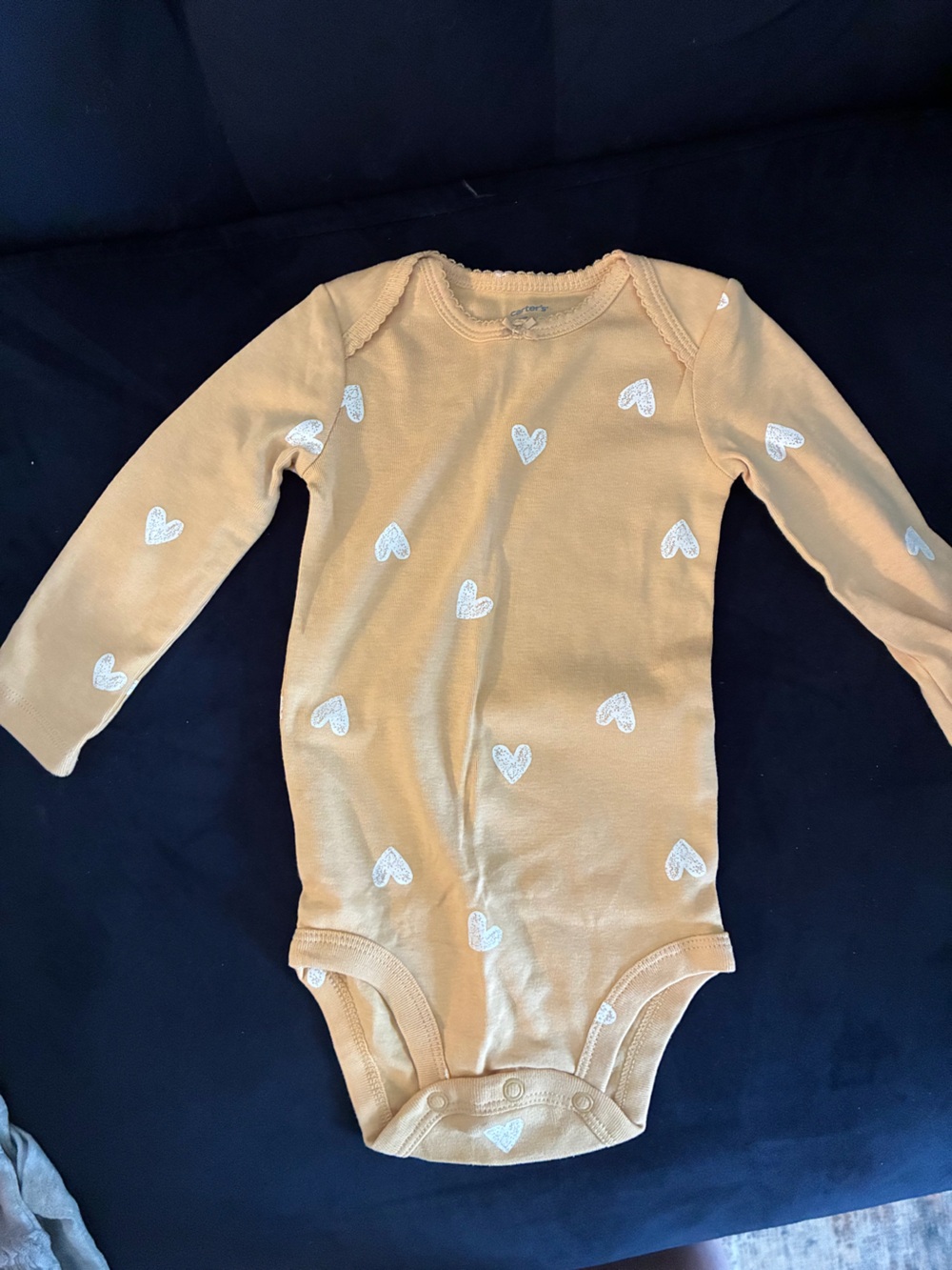 Carter's Mustard Long-Sleeve Bodysuit with White Hearts